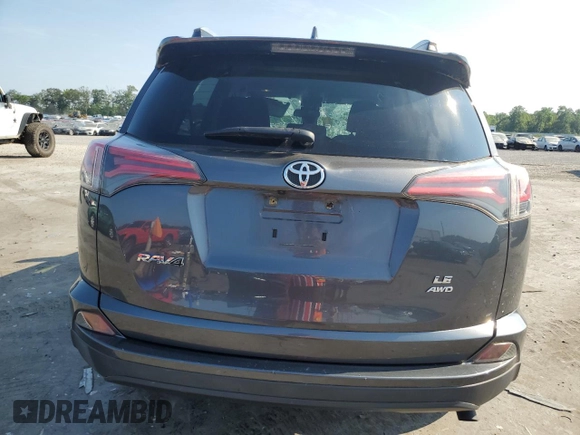 2017 Toyota RAV4 LE with VIN JTMBFREV2HD204349, listed as a Copart auction lot 63006825 with 141,795 mi miles and Salvage title. Bid and sale history available at DreamBid. Image 6.