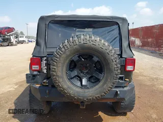 2010 Jeep Wrangler Sport with VIN 1J4AA2D15AL161650, listed as a IAAI auction lot 41805852 with 89,952 mi miles and . Bid and sale history available at carsss.com. Image 16.