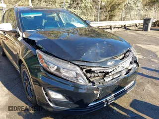 2015 Kia Optima Hybrid with VIN KNAGM4AD3F5088949, listed as a IAAI auction lot 41008816 with 138,921 mi miles. Bid and sale history available at carsss.com. Image 6.