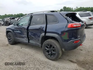 2015 Jeep Cherokee Trailhawk with VIN 1C4PJMBB8FW740452, listed as a Copart auction lot 63023715 with 96,236 mi miles and Salvage title. Bid and sale history available at DreamBid. Image 2.