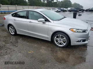 2016 Ford Fusion SE Hybrid z VIN 3FA6P0LUXGR350997, wystawiony jako Copart lot #62301825 z przebiegiem 267 537 mil mil oraz Szkoda całkowita • Salvage title. Historia ofert i sprzedaży dostępna na DreamBid. Obrazek 4.