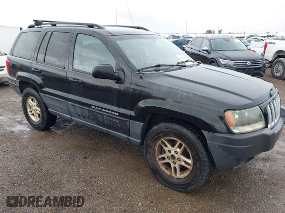 2004 Jeep Grand Cherokee Laredo with VIN 1J4GW48S74C390569, listed as a IAAI auction lot 42384503 with 191,530 mi miles and . Bid and sale history available at DreamBid. Image 1.