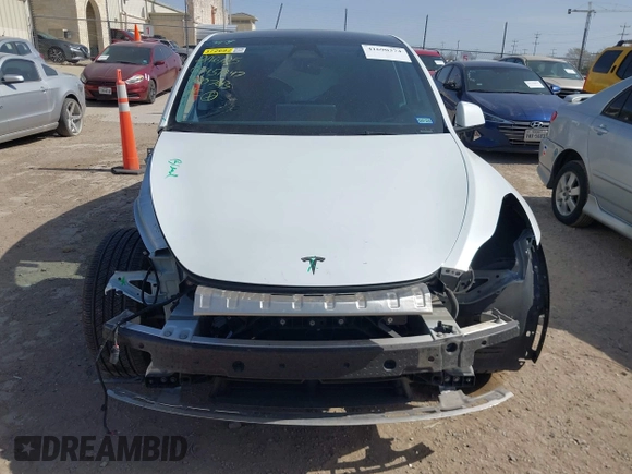 2024 Tesla Model Y with VIN 7SAYGDEDXRA300743, listed as a IAAI auction lot 41690374 with 12,446 mi miles and . Bid and sale history available at DreamBid. Image 13.