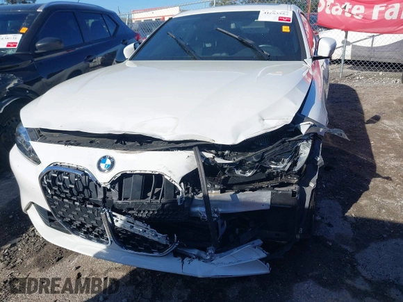 2021 BMW 4 Series 430i with VIN WBA53AP06MCG36919, listed as a IAAI auction lot 41863554 with 33,556 mi miles and . Bid and sale history available at DreamBid. Image 6.