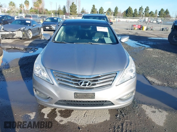 2013 Hyundai Azera z VIN KMHFH4JG3DA230844, wystawiony jako IAAI lot #41817997 z przebiegiem 129 163 mil mil oraz . Historia ofert i sprzedaży dostępna na DreamBid. Obrazek 13.