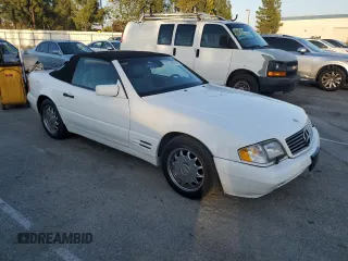 1997 Mercedes-Benz SL-Class with VIN WDBFA63F5VF143197, listed as a Copart auction lot 45003735 with 100,250 mi miles and Salvage Title. Bid and sale history available at carsss.com. Image 4.