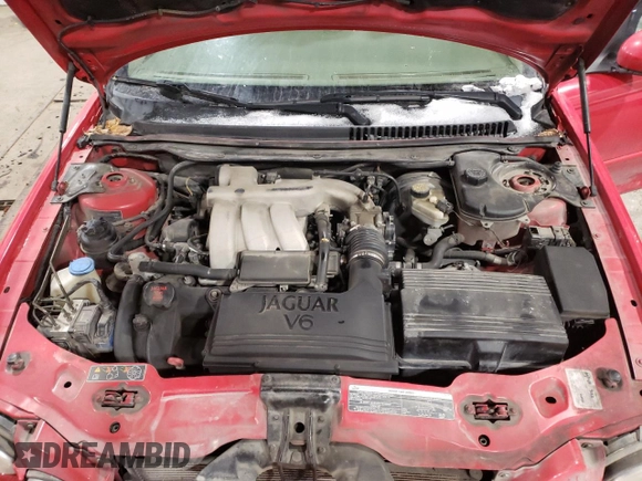 2004 Jaguar X-Type with VIN SAJEA51CX4WE15195, listed as a Copart auction lot 57868405 with 171,698 mi miles and Non Repairable. Bid and sale history available at DreamBid. Image 11.