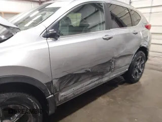 2017 Honda CR-V Touring with VIN 2HKRW2H90HH603307, listed as a IAAI auction lot 41868564 with 81,144 mi miles. Bid and sale history available at carsss.com. Image 6.