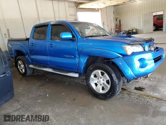 2010 Toyota Tacoma with VIN 5TELU4ENXAZ693805, listed as a Copart auction lot 63012925 with 184,619 mi miles and Salvage title. Bid and sale history available at DreamBid. Image 4.