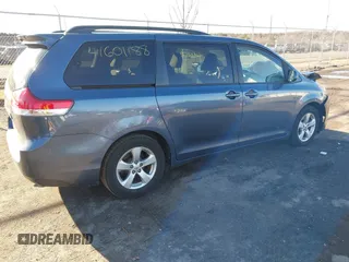 2014 Toyota Sienna LE AAS with VIN 5TDKK3DC4ES514981, listed as a IAAI auction lot 41601188 with 164,963 mi miles and . Bid and sale history available at DreamBid. Image 4.