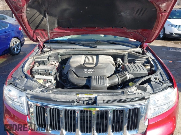 2012 Jeep Grand Cherokee Laredo with VIN 1C4RJFAG3CC163764, listed as a IAAI auction lot 41719137 with 198,827 mi miles. Bid and sale history available at carsss.com. Image 10.