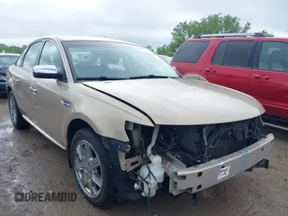 2008 Ford Taurus Limited z VIN 1FAHP25W98G122789, wystawiony jako IAAI lot #41921385 z przebiegiem 98 662 mil mil oraz . Historia ofert i sprzedaży dostępna na DreamBid. Obrazek 1.