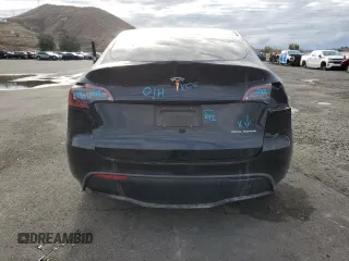 2023 Tesla Model Y Long Range with VIN 7SAYGDEE8PF877926, listed as a Copart auction lot 44342645 with 41,408 mi miles and Salvage Title. Bid and sale history available at DreamBid. Image 6.