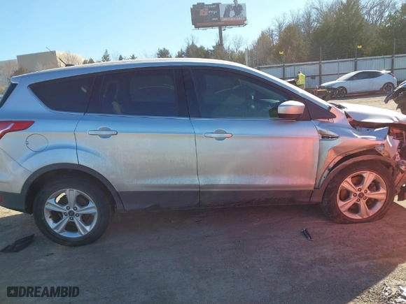 2015 Ford Escape SE with VIN 1FMCU0G9XFUC86975, listed as a IAAI auction lot 41689133 with 63,270 mi miles. Bid and sale history available at carsss.com. Image 12.