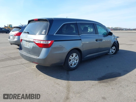 2012 Honda Odyssey LX with VIN 5FNRL5H24CB145694, listed as a IAAI auction lot 41902821 with 134,402 mi miles and . Bid and sale history available at carsss.com. Image 4.