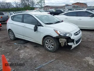 2013 Hyundai Accent GL with VIN KMHCT5AEXDU068215, listed as a IAAI auction lot 41922280 with 159,978 mi miles. Bid and sale history available at carsss.com. Image 1.