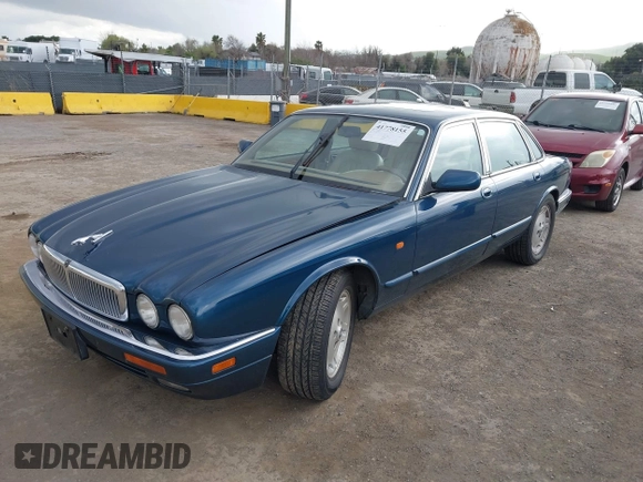 1996 Jaguar XJ with VIN SAJHX1743TC759842, listed as a IAAI auction lot 41778155 with 189,315 mi miles and . Bid and sale history available at DreamBid. Image 6.