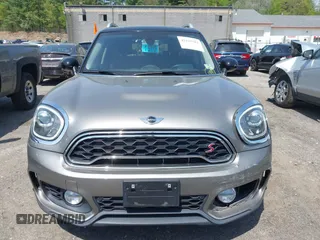 2017 MINI Countryman Cooper S z VIN WMZYT5C33H3D79148, wystawiony jako IAAI lot #42225781 z przebiegiem 95 023 mil mil oraz . Historia ofert i sprzedaży dostępna na DreamBid. Obrazek 12.