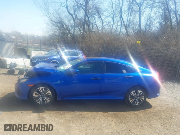 2016 Honda Civic Sedan EX-T with VIN 19XFC1F30GE026799, listed as a IAAI auction lot 41837076 with 127,421 mi miles. Bid and sale history available at carsss.com. Image 14.