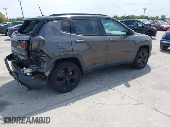 2018 Jeep Compass Latitude with VIN 3C4NJDBB1JT402381, listed as a IAAI auction lot 41844313 with 67,918 mi miles and . Bid and sale history available at DreamBid. Image 4.