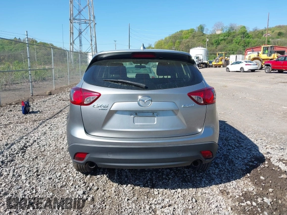 2013 Mazda CX-5 Sport with VIN JM3KE4BE0D0125748, listed as a IAAI auction lot 42143020 with 158,580 mi miles. Bid and sale history available at carsss.com. Image 16.