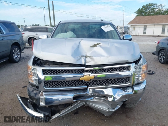2013 Chevrolet Silverado 1500 LT with VIN 3GCPCSEA4DG234422, listed as a IAAI auction lot 41907573 with 95,696 mi miles and . Bid and sale history available at DreamBid. Image 12.