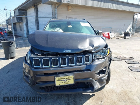 2018 Jeep Compass Altitude with VIN 3C4NJDBB6JT239565, listed as a IAAI auction lot 42219401 with 85,013 mi miles and . Bid and sale history available at DreamBid. Image 12.