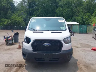 2024 Ford Transit Cargo z VIN 1FTBW1Y85RKA00455, wystawiony jako IAAI lot #42436443 z przebiegiem 8 015 mil mil oraz . Historia ofert i sprzedaży dostępna na DreamBid. Obrazek 12.