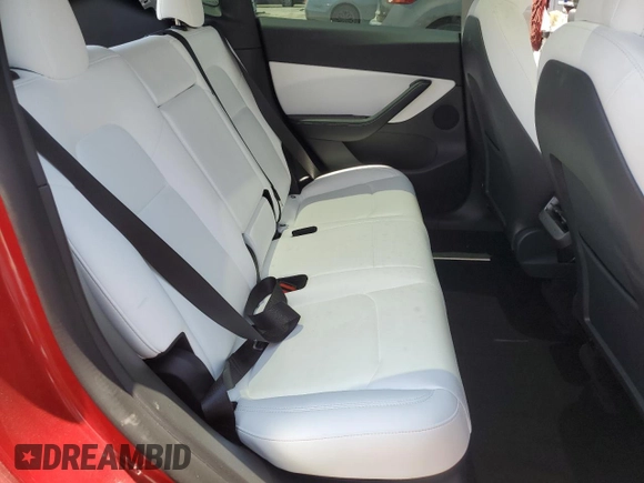2022 Tesla Model Y Performance z VIN 7SAYGDEF9NF510183, wystawiony jako Copart lot #61263405 z przebiegiem 19 411 mil mil oraz Szkoda całkowita • Salvage title. Historia ofert i sprzedaży dostępna na DreamBid. Obrazek 10.