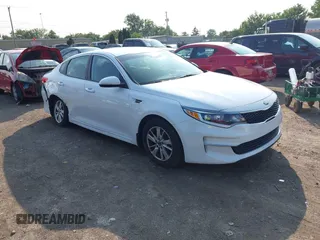 2016 Kia Optima LX z VIN 5XXGT4L38GG101007, wystawiony jako IAAI lot #42388470 z przebiegiem 88 972 mil mil oraz . Historia ofert i sprzedaży dostępna na DreamBid. Obrazek 1.