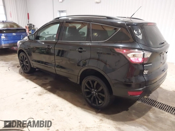2017 Ford Escape SE with VIN 1FMCU9GD8HUF04133, listed as a IAAI auction lot 41390354 with 93,139 mi miles. Bid and sale history available at carsss.com. Image 3.