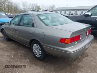 2001 Toyota Camry CE with VIN 4T1BG22K01U060588, listed as a IAAI auction lot 42040071 with 165,446 mi miles and . Bid and sale history available at DreamBid. Image 3.