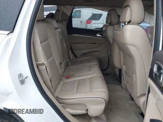 2014 Jeep Grand Cherokee Overland with VIN 1C4RJFCG9EC162098, listed as a IAAI auction lot 41746022 with 120,588 mi miles and . Bid and sale history available at DreamBid. Image 8.