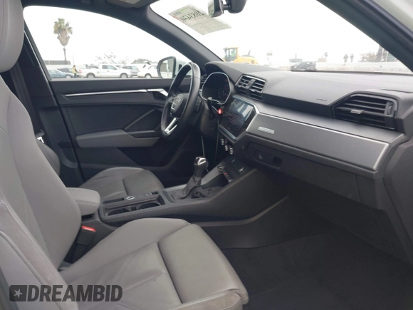 2022 Audi Q3 S line Premium Plus with VIN WA1EECF35N1017446, listed as a IAAI auction lot 42083430 with 37,713 mi miles and . Bid and sale history available at DreamBid. Image 5.