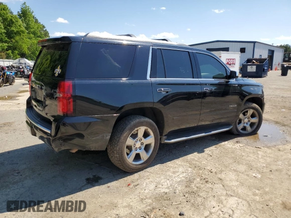 2018 Chevrolet Tahoe Premier with VIN 1GNSKCKC1JR133625, listed as a Copart auction lot 54900974 with 130,921 mi miles and Salvage title. Bid and sale history available at DreamBid. Image 3.