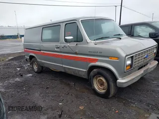 1990 Ford Econoline Cargo z VIN 1FTDE14Y4LHA18080, wystawiony jako IAAI lot #42324693 z przebiegiem Nie podano mil oraz . Historia ofert i sprzedaży dostępna na DreamBid. Obrazek 1.