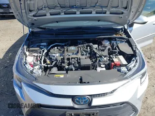 2023 Toyota Corolla Hybrid LE with VIN JTDBCMFE1P3015786, listed as a IAAI auction lot 41887102 with 27,123 mi miles. Bid and sale history available at carsss.com. Image 10.