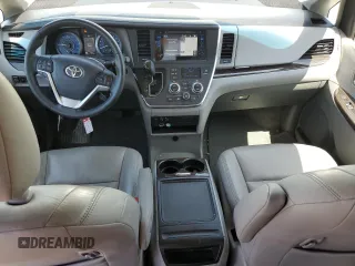 2016 Toyota Sienna XLE с VIN 5TDYK3DC5GS740962, выставлен на аукционе Copart как лот 61189865 с пробегом 75 722 миль миль и Списание • Salvage title. История ставок и продаж доступна на DreamBid. Изображение 8.
