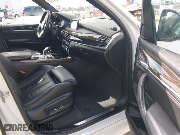 2016 BMW X5 xDrive35i with VIN 5UXKR0C56G0P32566, listed as a IAAI auction lot 41899474 with 79,563 mi miles. Bid and sale history available at carsss.com. Image 5.