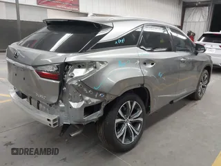 2022 Lexus RX 350 with VIN 2T2HZMAA6NC232022, listed as a IAAI auction lot 42528304 with 22,576 mi miles and . Bid and sale history available at DreamBid. Image 4.