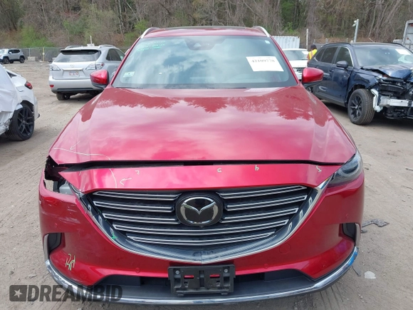 2019 Mazda CX-9 Grand Touring with VIN JM3TCBDY8K0333394, listed as a IAAI auction lot 42109778 with 58,887 mi miles and . Bid and sale history available at DreamBid. Image 13.