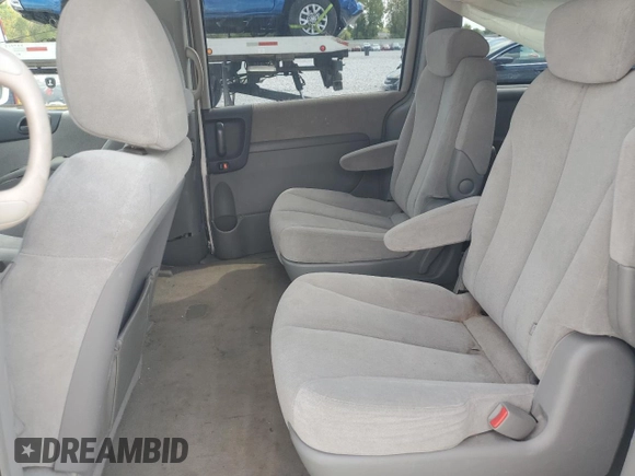 2006 Kia Sedona LX with VIN KNDMB233666057581, listed as a Copart auction lot 71027674 with 206,556 mi miles and Salvage Title. Bid and sale history available at carsss.com. Image 12.