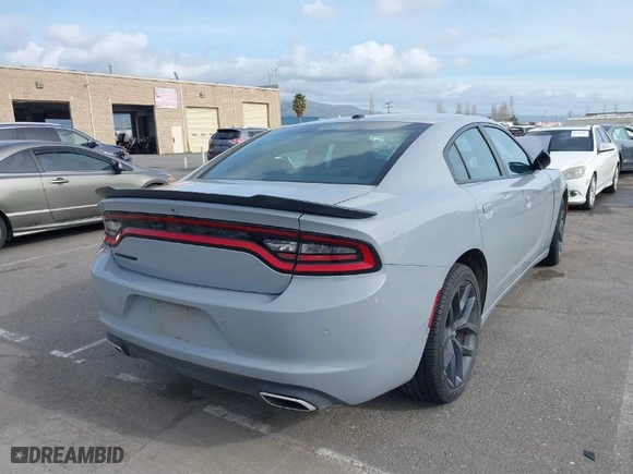 2022 Dodge Charger SXT with VIN 2C3CDXBG7NH208565, listed as a IAAI auction lot 41603859 with 48,438 mi miles. Bid and sale history available at carsss.com. Image 4.