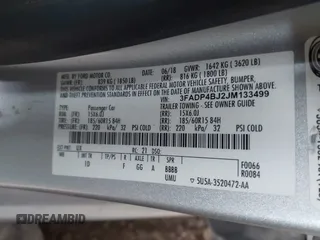 2018 Ford Fiesta SE with VIN 3FADP4BJ2JM133499, listed as a IAAI auction lot 41547240 with 125,186 mi miles. Bid and sale history available at carsss.com. Image 9.