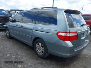 2007 Honda Odyssey EX-L with VIN 5FNRL38747B121059, listed as a IAAI auction lot 42211056 with 171,838 mi miles and . Bid and sale history available at DreamBid. Image 3.