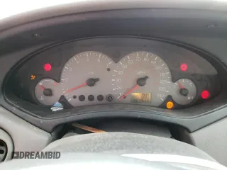 2000 Ford Focus LX with VIN 1FAFP33P8YW381773, listed as a Copart auction lot 80168174 with 151,410 mi miles and Salvage Title. Bid and sale history available at DreamBid. Image 9.