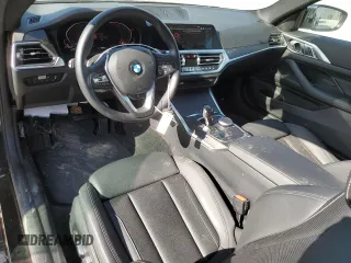 2023 BMW 4 Series 430i with VIN WBA53AP00PCL19557, listed as a Copart auction lot 55710174 with 14,982 mi miles and Salvage title. Bid and sale history available at DreamBid. Image 8.