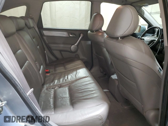 2009 Honda CR-V EX-L z VIN 5J6RE487X9L069169, wystawiony jako Copart lot #58907595 z przebiegiem 114 289 mil mil oraz Szkoda całkowita • Salvage title. Historia ofert i sprzedaży dostępna na DreamBid. Obrazek 11.