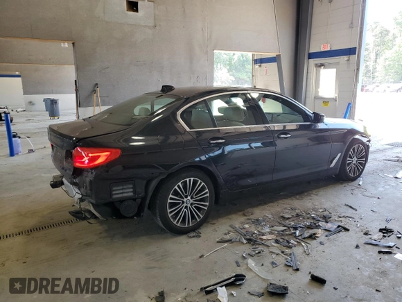 2018 BMW 5 Series 540i xDrive with VIN WBAJE7C56JWC57314, listed as a Copart auction lot 60610715 with 73,015 mi miles and Salvage title. Bid and sale history available at DreamBid. Image 3.