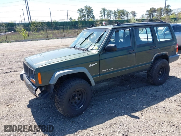 1998 Jeep Cherokee Sport with VIN 1J4FJ68S9WL189992, listed as a IAAI auction lot 42039822 with 156,006 mi miles. Bid and sale history available at carsss.com. Image 2.